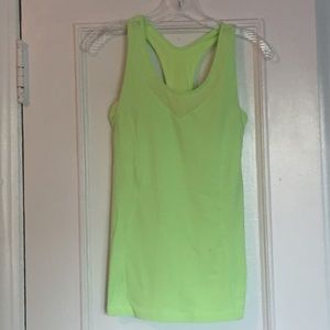 Lime green, gently used lululemon tank with cups