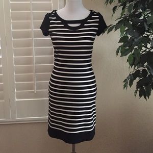 Cute black and white dress with silver detail