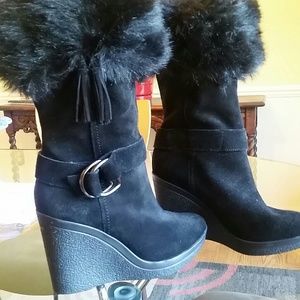 NWOT suede boots with fur cuff and tassel.  NWOT
