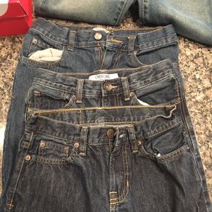 Three pairs of boys dark jeans