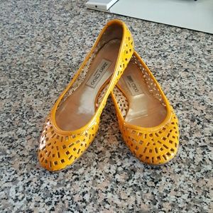 Yellow leather flats