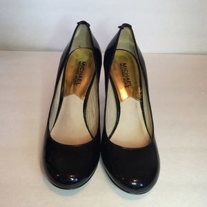 Michael Kors black patent pumps