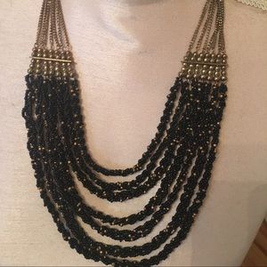Gold and black necklace
