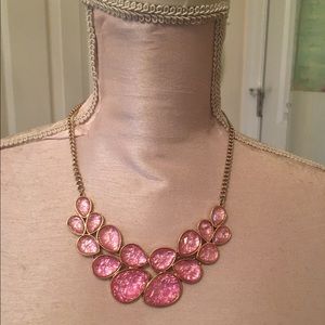 Pink jeweled necklace with gold hardware