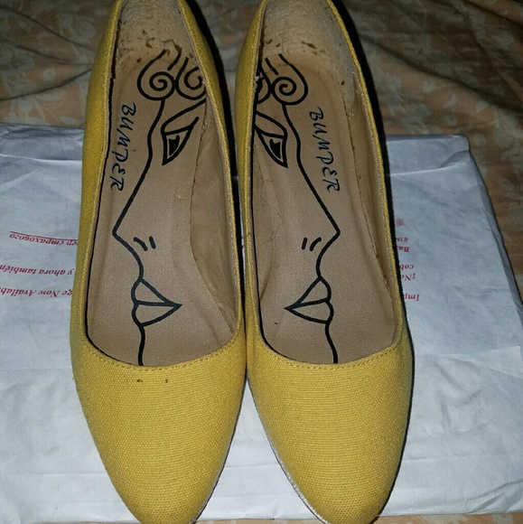 Yellow wedge shoes