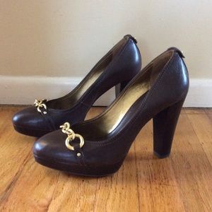 Brown leather pump with gold buckle