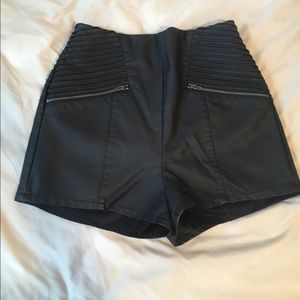 Black Bebe faux leather skirt