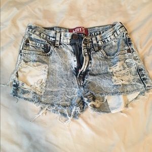 Washed out distressed Levi shorts