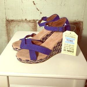 RESERVED. TOMS Woven Wedges
