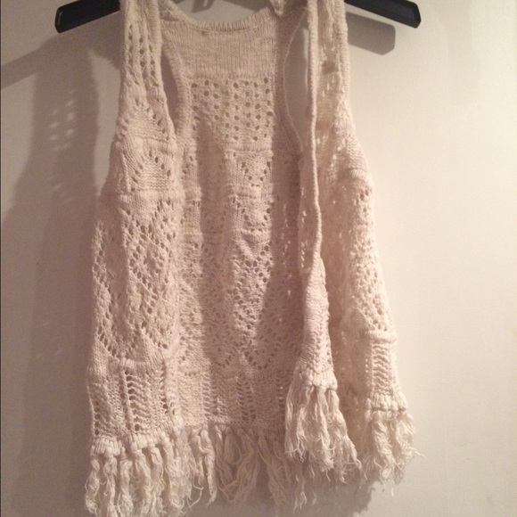 White loose knit, sleeveless cardigan