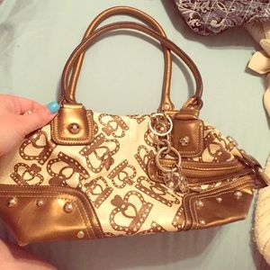 Kathy Van Zeeland gold crown shoulder bag