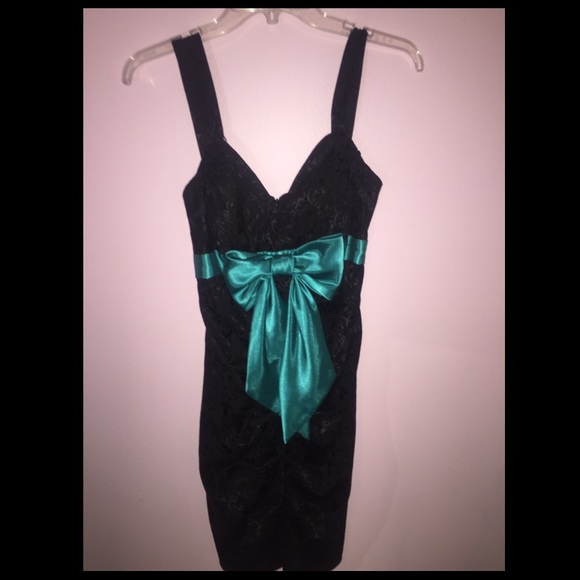 Black dress with teal bow. Size 2-4.