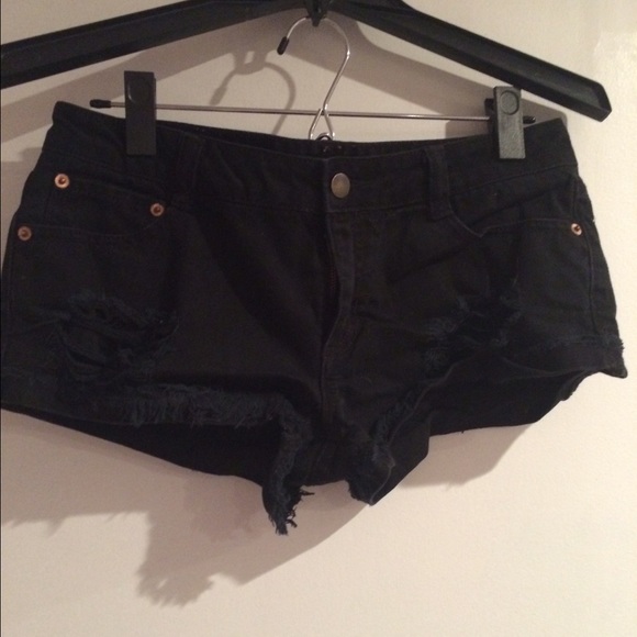 Black, ripped denim shorts