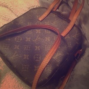 Brown LV purse  Authentic Spontini