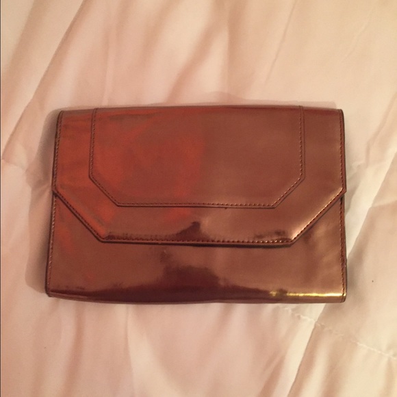 Bcbg bronze pouch clutch