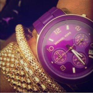 Like new Michael Kors purple rubber watch