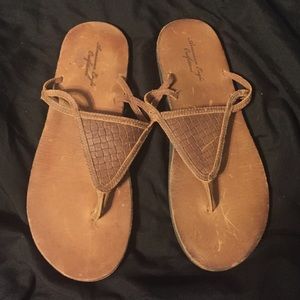 Brown flip flops