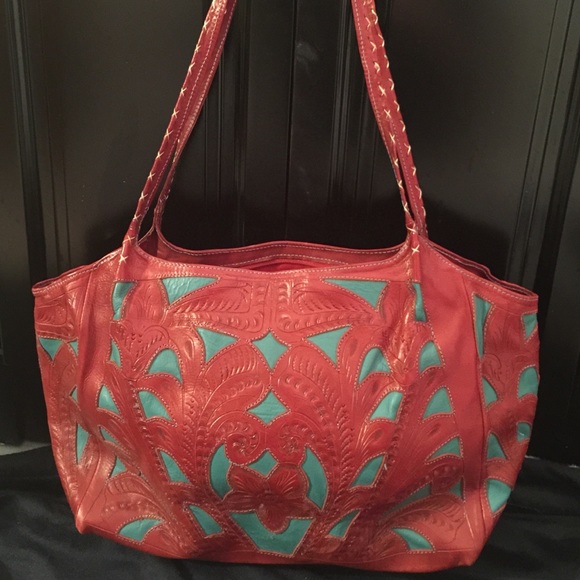 A beautiful leather red and turquoise shoulder bag