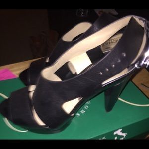 Michael Kors black strap semi wedges. Worn once.