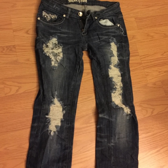 never worn ripped jeans