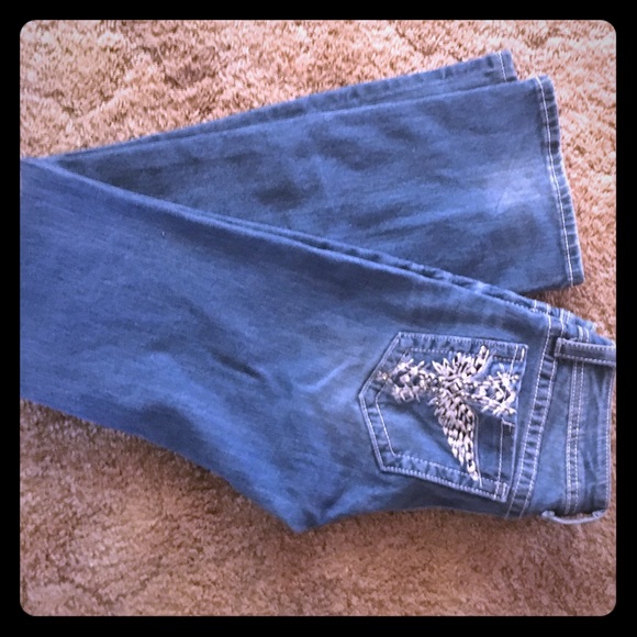 White and diamond cross miss me jeans