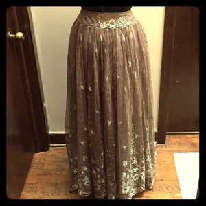 Carmen Marc Valvo gold/nude tulle and lace skirt.