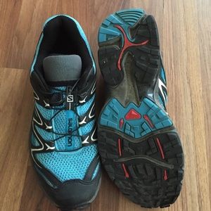 Salomon running trail shoes.  Great condition.