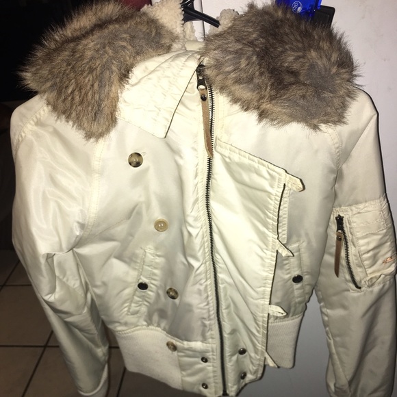 Puffy beige rain/snow jacket