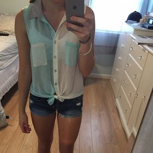 multi colored sleeveless button down with tie