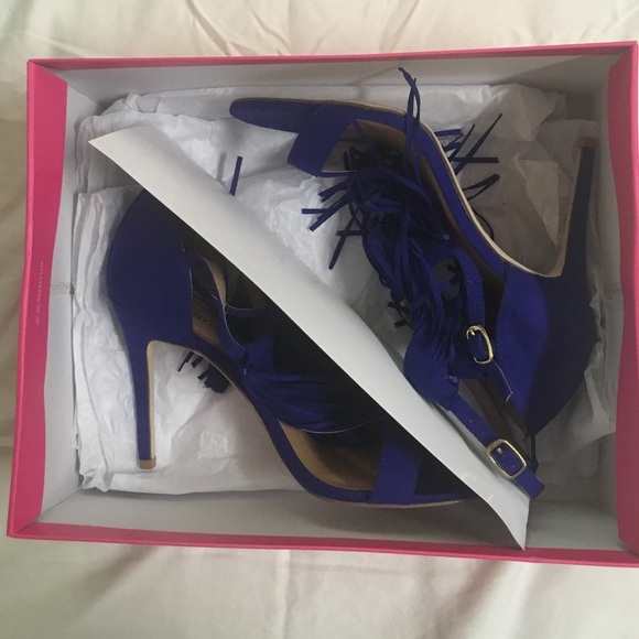 Blue suede heels with fringe