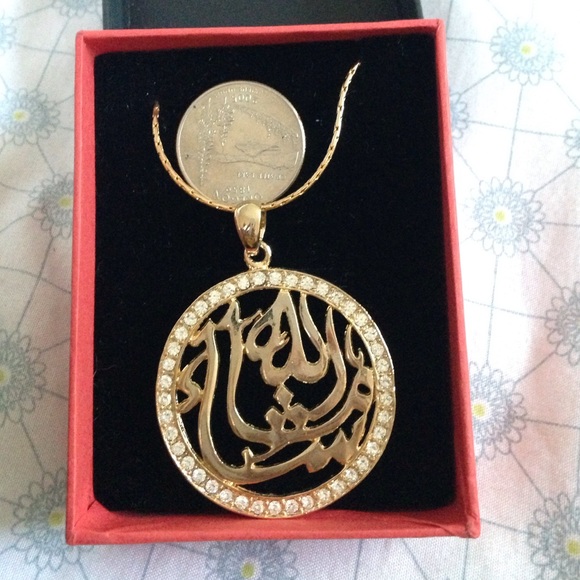 Arbic calligraphic pendent brand new gold plated.