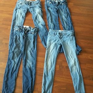 A bundle of 4 pairs of jeans. All size 0.