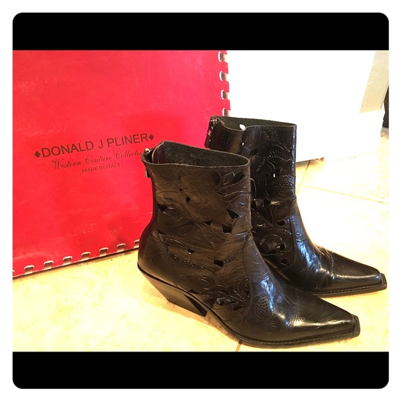 Super cute lattice work boots with slanted heel.