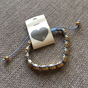 Brandy Melville skull bracelet