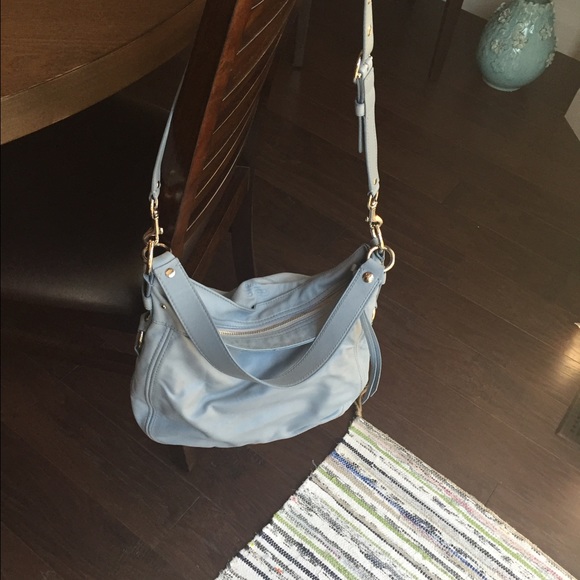 Powder blue sack style coach purse.