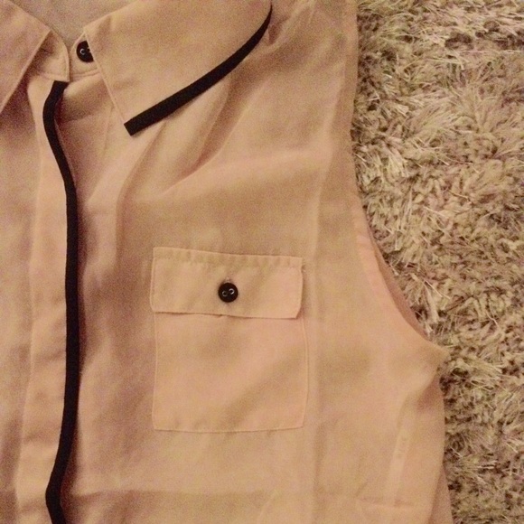 Sleeveless sheer button up shirt