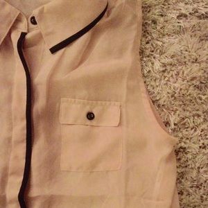 Sleeveless sheer button up shirt