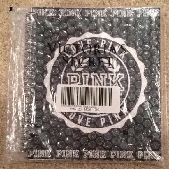 Brand new sealed in package PINK planner in black