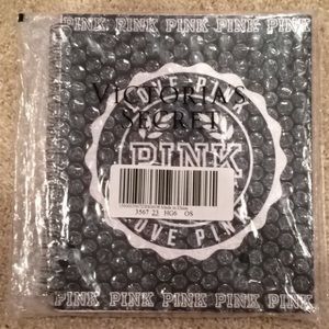 Brand new sealed in package PINK planner in black