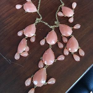 Charming Charlie's pink teardrop necklace.