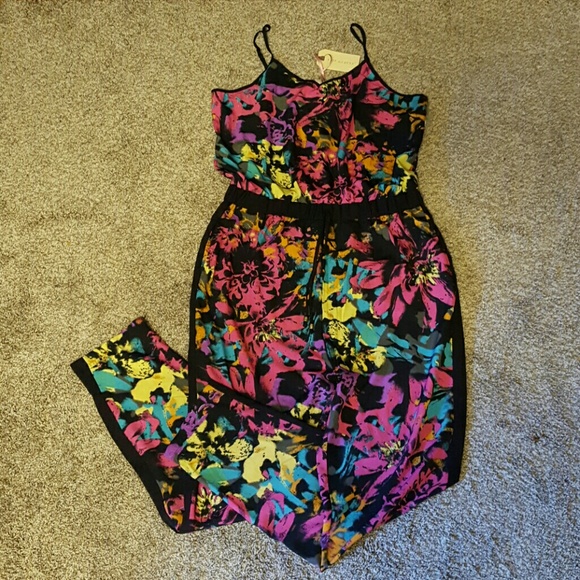 Flirty and colorful tuxedo pant romper