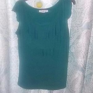 Turquoise sleeveless blouse