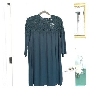 Dark green dress with lace accent