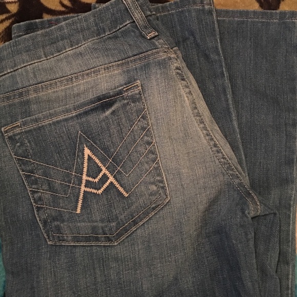 Flare jeans. Also listed on Mercari
