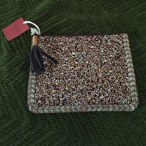 Mossimo Supply Co. Bags - Super cute for fall! Tassel beaded clutch Mossimo Supply Co. Bags - Super cute for fall! Tassel beaded clutch