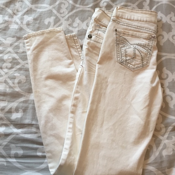 White hydraulic skinny jeans