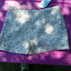 Silver lace shorts