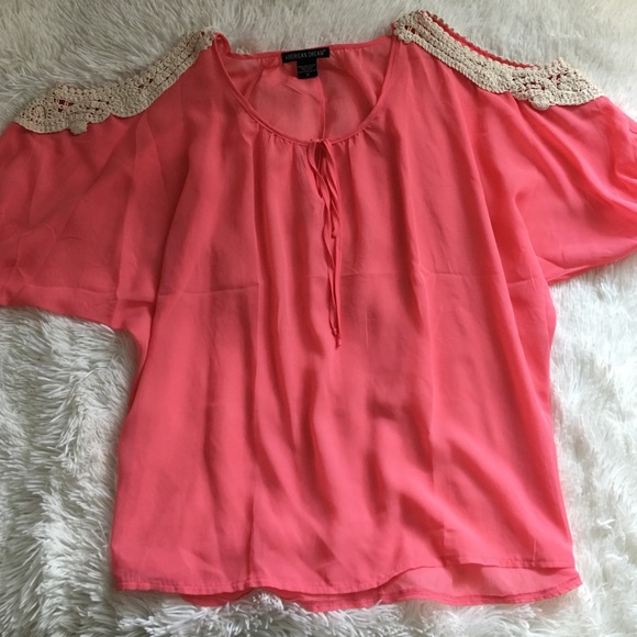 Coral top with crochet openings at shoulders