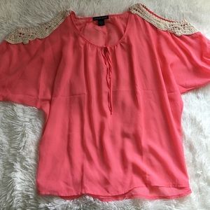 Coral top with crochet openings at shoulders