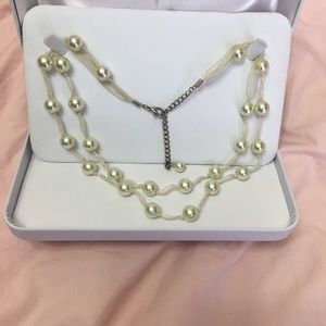 String of faux pearls 📿🎀